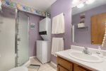 Guest bathroom with shower and laundry